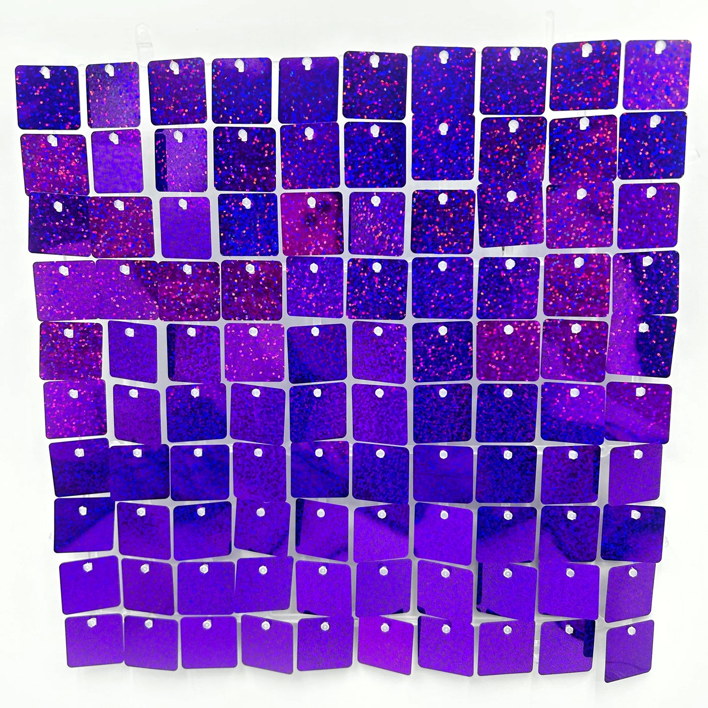 Grid of purple glittery dog tags on a white background